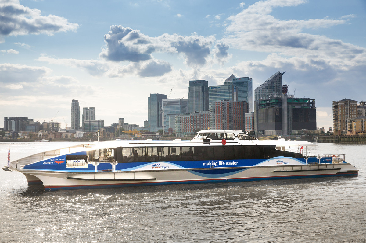 Thames Clippers servicing Marine Wharf East along River Thames